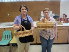 Michelle and Linda proudly display their baskets