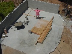 We got two concrete block walls in place